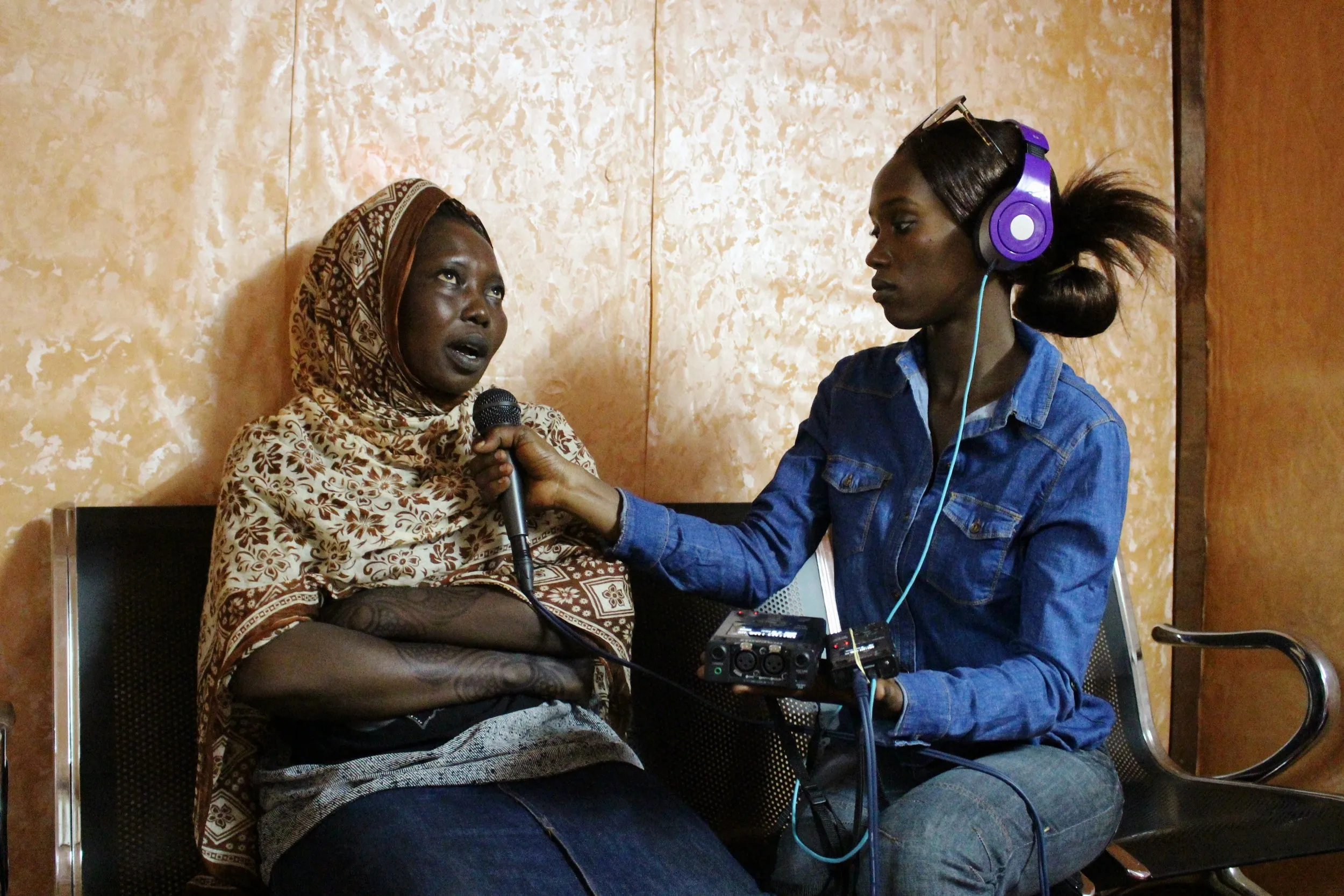 South Sudanese journalist conducting an interview